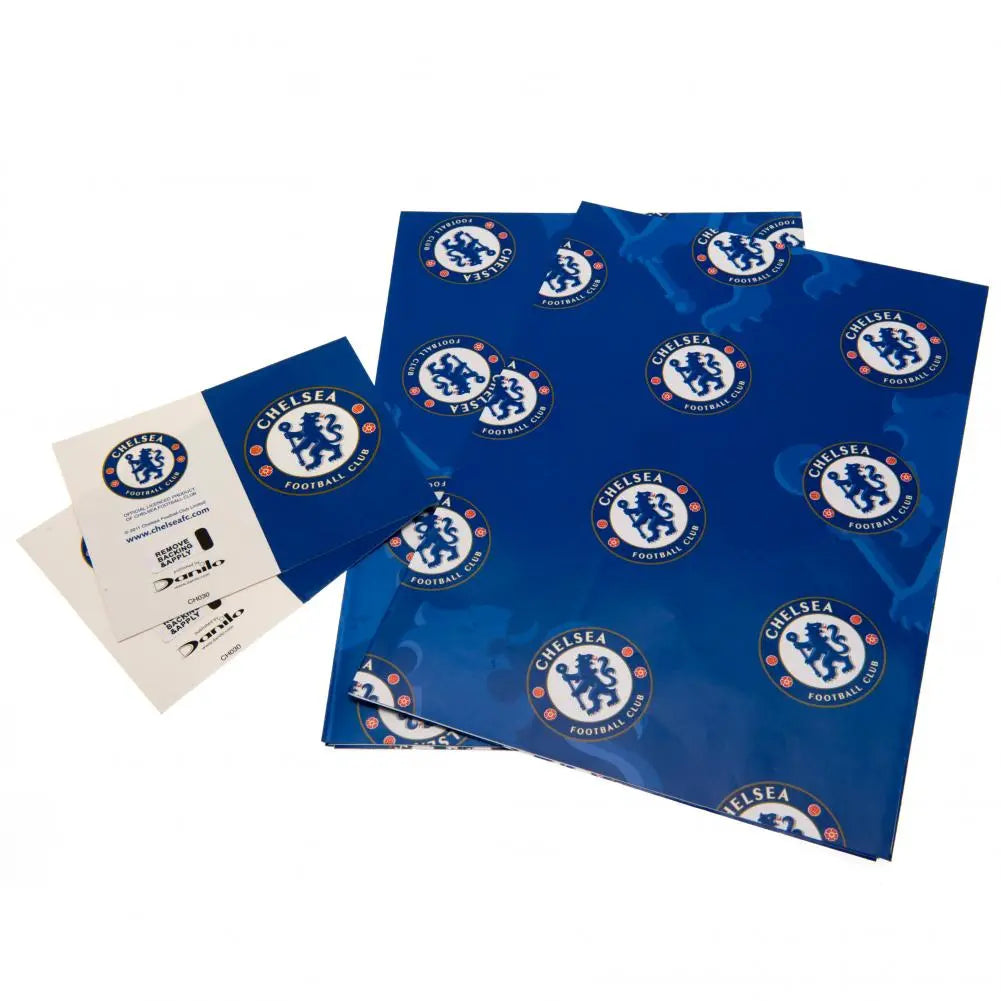 Two sheets of wrapping paper with the Chelsea FC team crest and traditional blue color scheme, accompanied by gift tags.