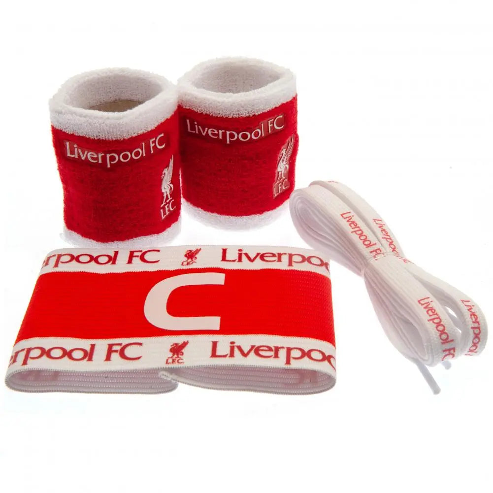 A set of Liverpool FC branded sports accessories, including two wristbands, two sock ties, and one captain's arm band, all in red and white colors.