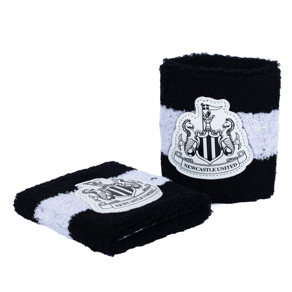Black and white wristbands with Newcastle United logo on a white background
