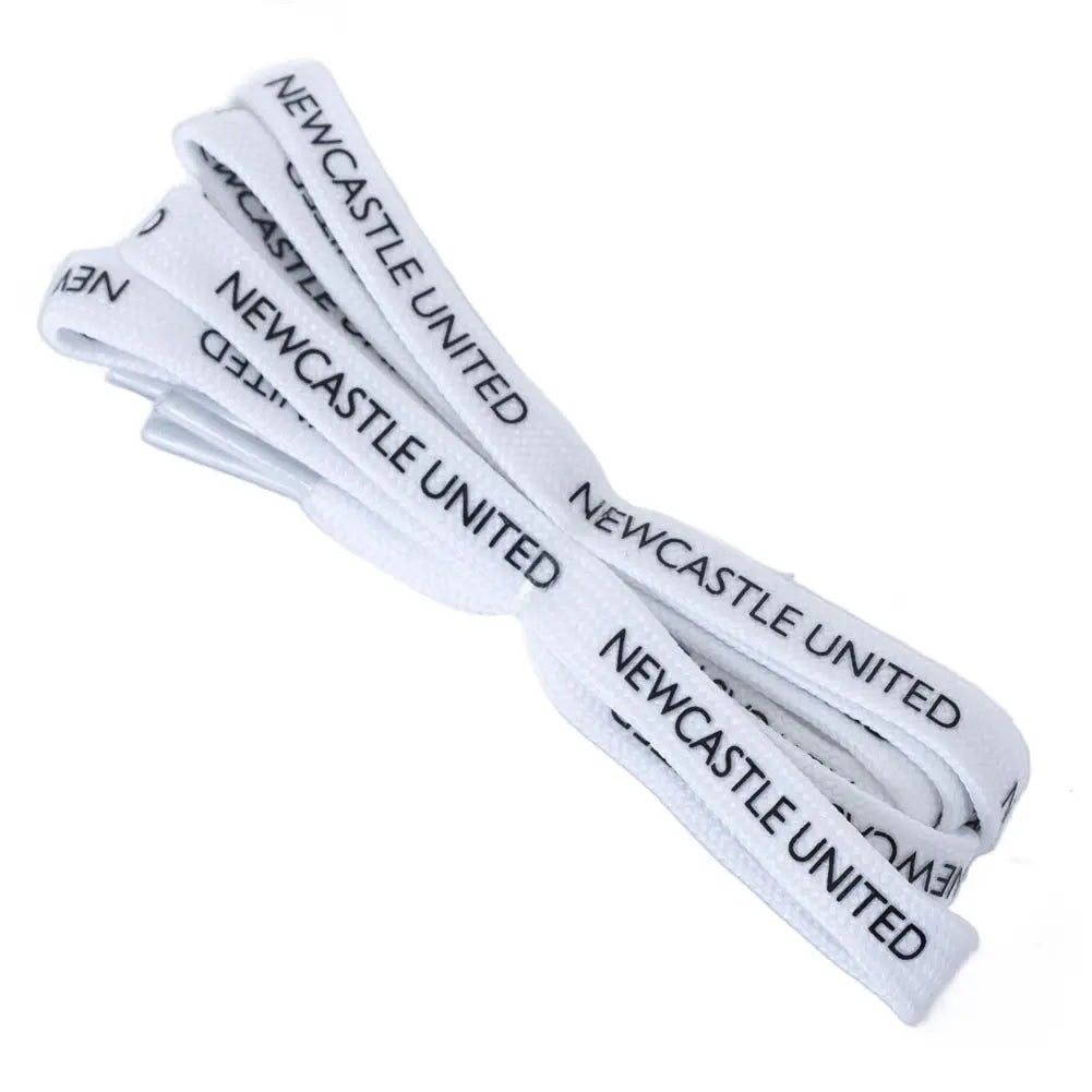 White shoelaces with 'Newcastle United' branding on a white background