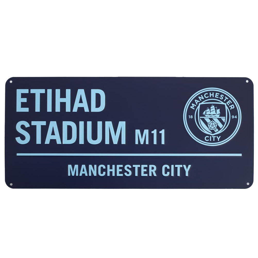 Manchester City Etihad Stadium sign with club logo on a white background
