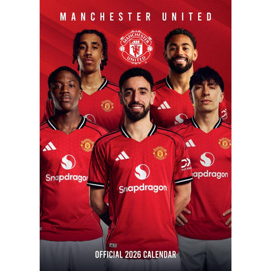 Manchester United calendar cover with players wearing red jerseys on a red background