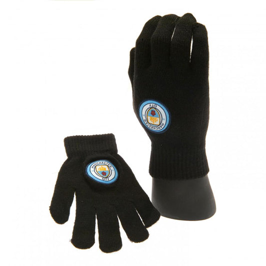 Black Manchester City Kids gloves with a logo on a white background