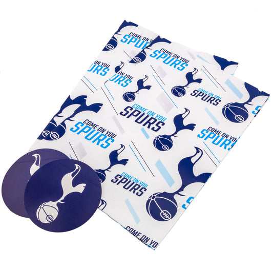 Spurs-themed wrapping paper with branding and text on a white background