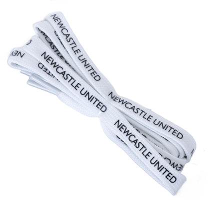 White shoelaces with 'Newcastle United' branding on a white background