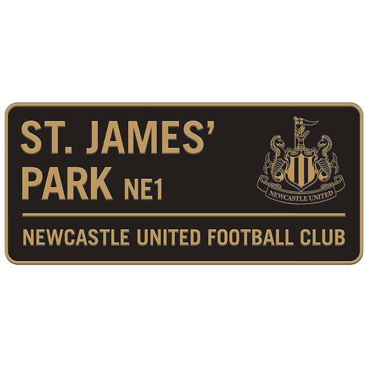 St. James' Park sign with Newcastle United logo on a white background