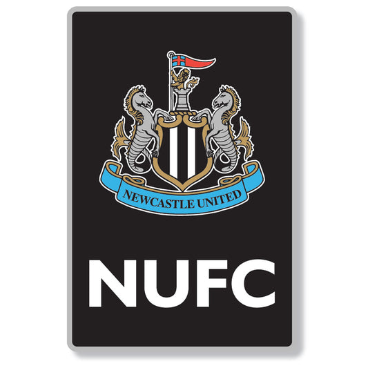 A rectangular black sign or sticker featuring the Newcastle United crest at the top and the large white letters 'NUFC' below, shown on a light gray background.