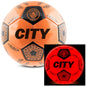 Orange soccer ball with 'CITY' text and logo, including a close-up of the ball glowing red.