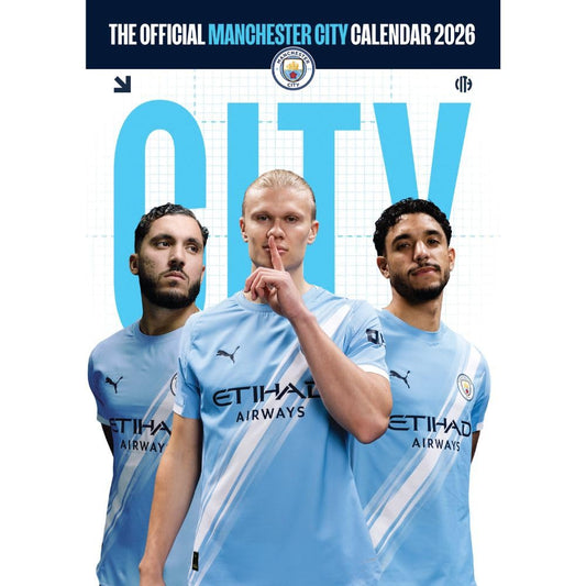 Manchester City calendar cover with three players in light blue jerseys.