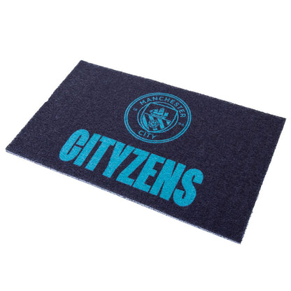 Navy doormat with Manchester City logo and 'CITYzens' text on a white background