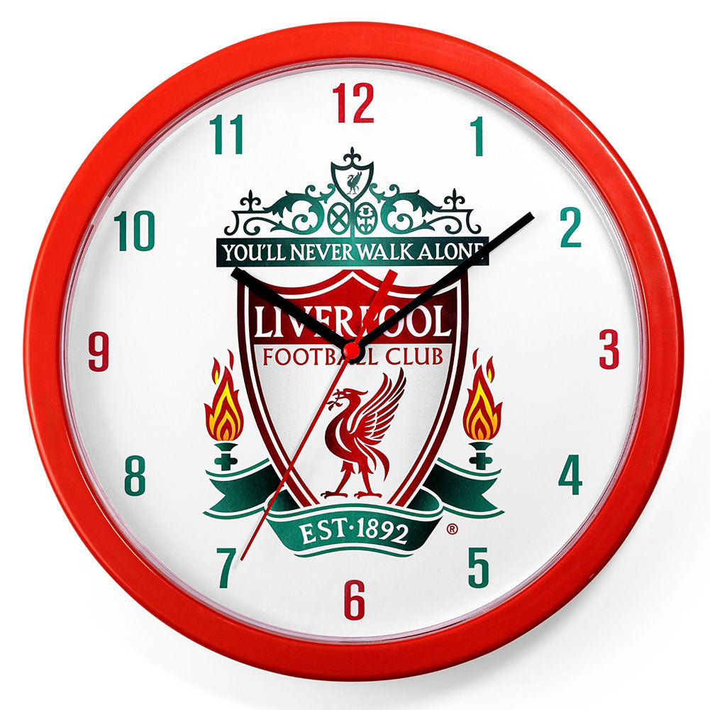 A round wall clock with a red frame and a white face featuring the Liverpool Football Club crest, red and green numerals, and black hands.