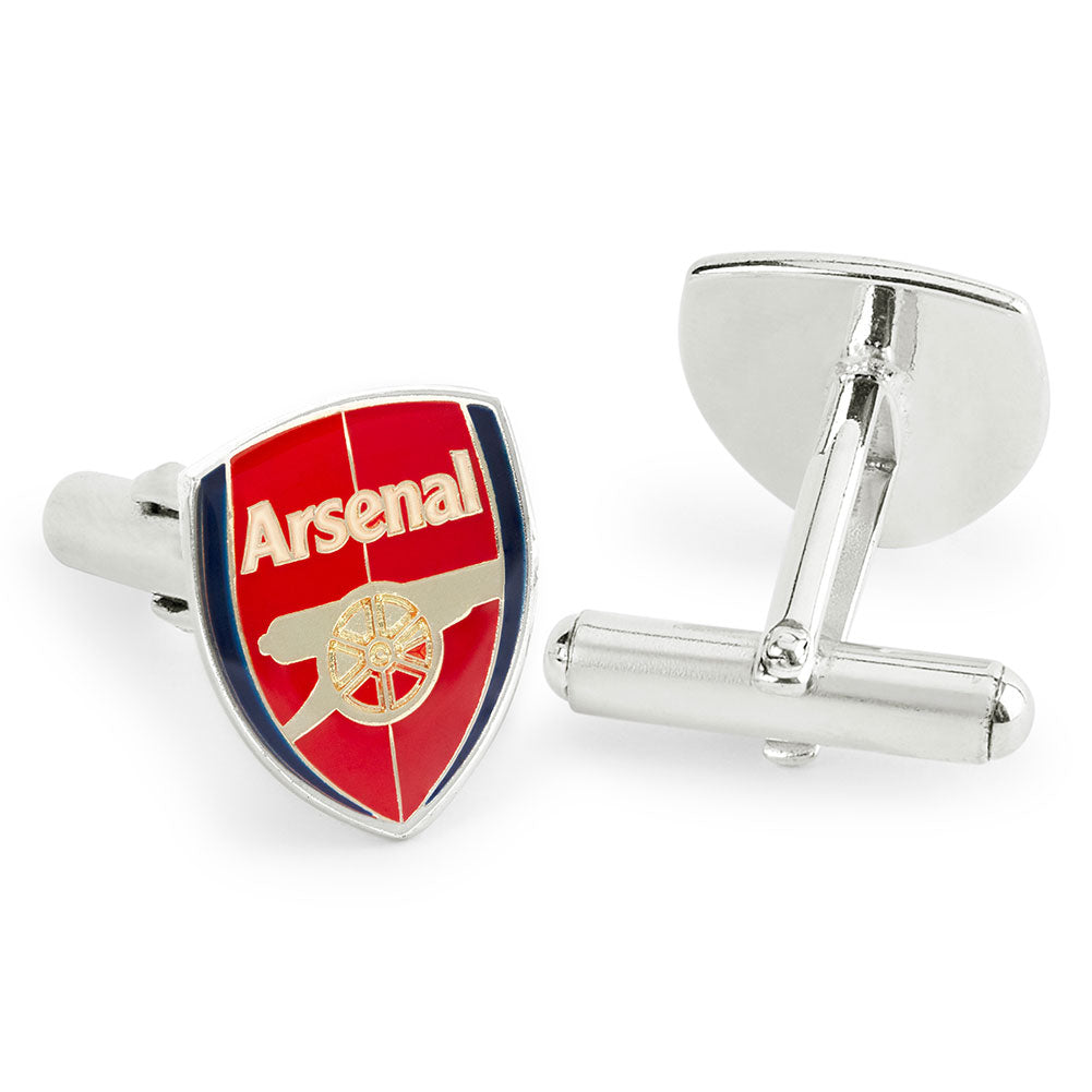 A pair of silver-toned cufflinks on a white background, one showing the front with an Arsenal football club crest enamel design and the other showing the back with a T-bar closure.