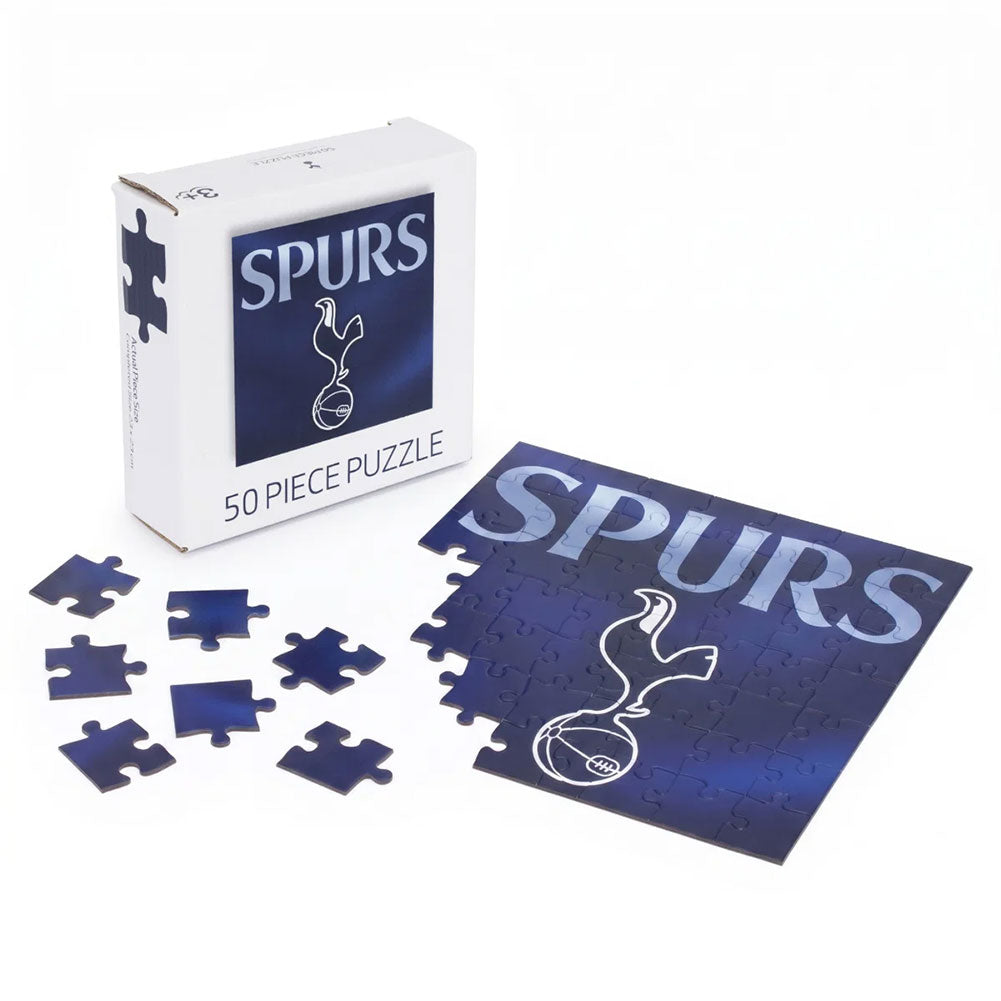 A 50-piece Tottenham Hotspur 'Spurs' jigsaw puzzle shown with its white retail box and several loose pieces on a clean white background.